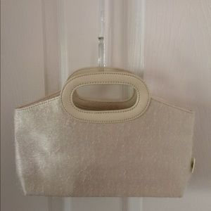 Givenchy Evening Hand Bag has 2 small spots on it